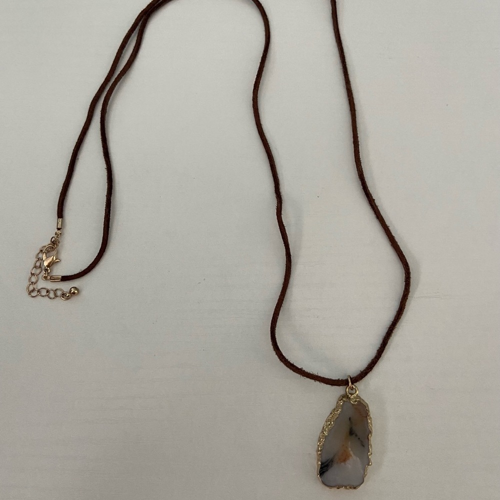 Stone long necklace on brown cord